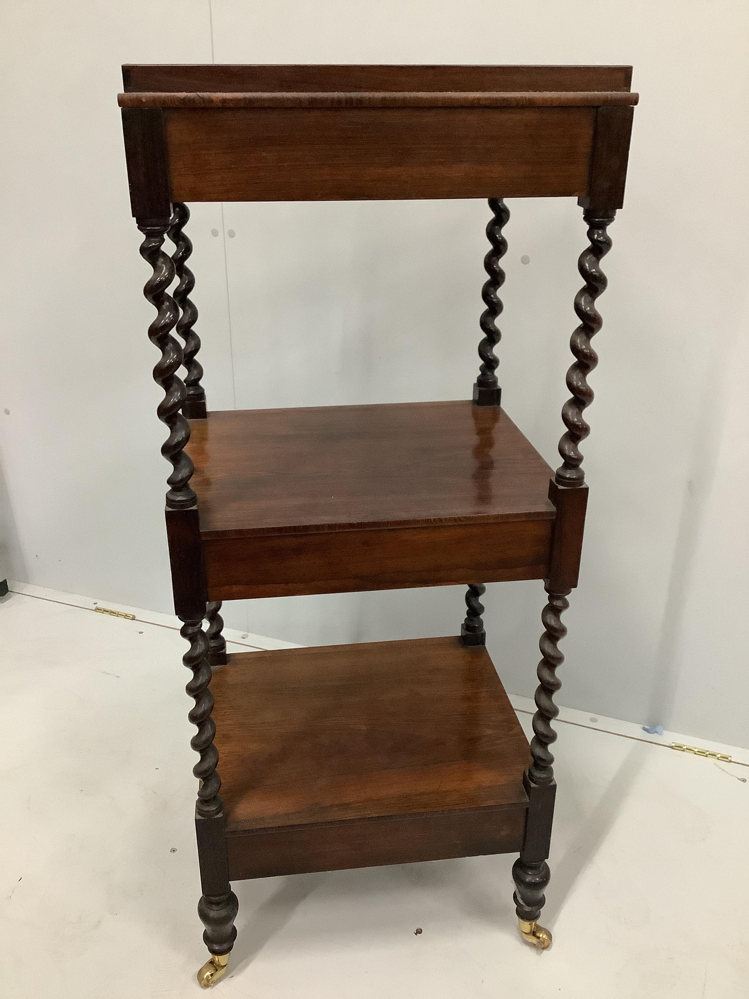 A Victorian rosewood three tier whatnot, width 48cm, depth 41cm, height 118cm